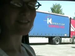 Skirt girl sucks knob at truck stop